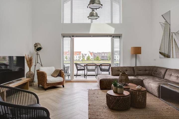 Ferienwohnung für 4 Personen, mit Balkon und Terrasse sowie Sauna und Seeblick