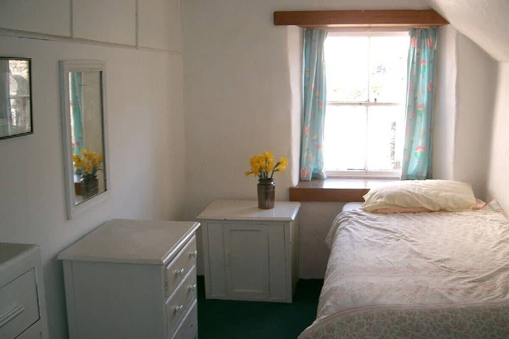 Historic beamed cottage near beach overlooking St Michael's Mount in Marazion, Cornwall