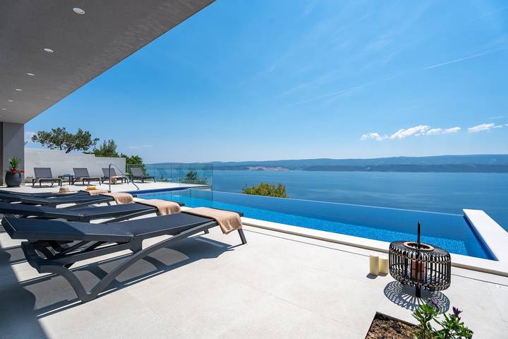Dom wakacyjny dla 10 osób, z Balkon/ taras i Widok na ocean oraz Basen w Stanici