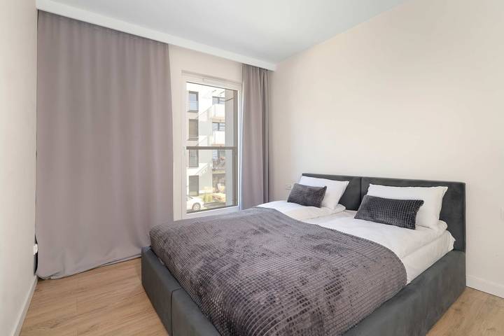 Entire apartment, Spacious Apartment with a balcony | Close to the Airport in Poznan, Greater Poland