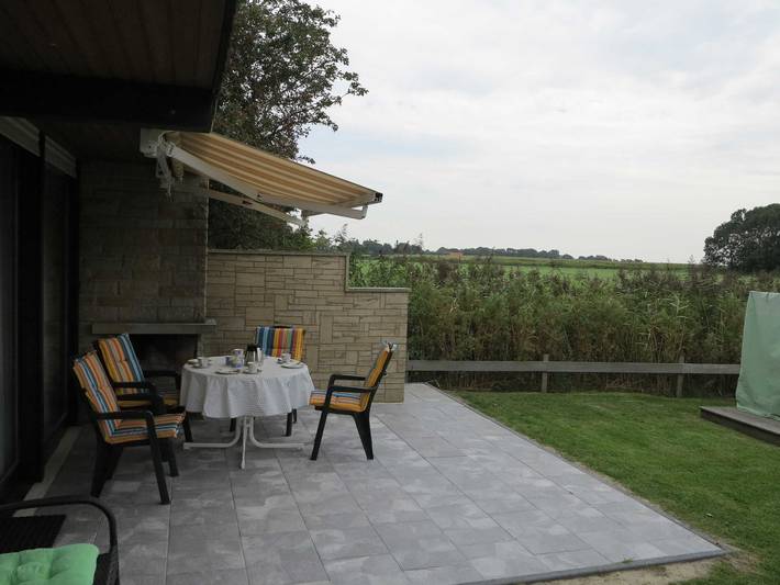 Ferienhaus für 4 Personen, mit Garten und Ausblick sowie Terrasse und Seeblick in Wesermarsch - 4
