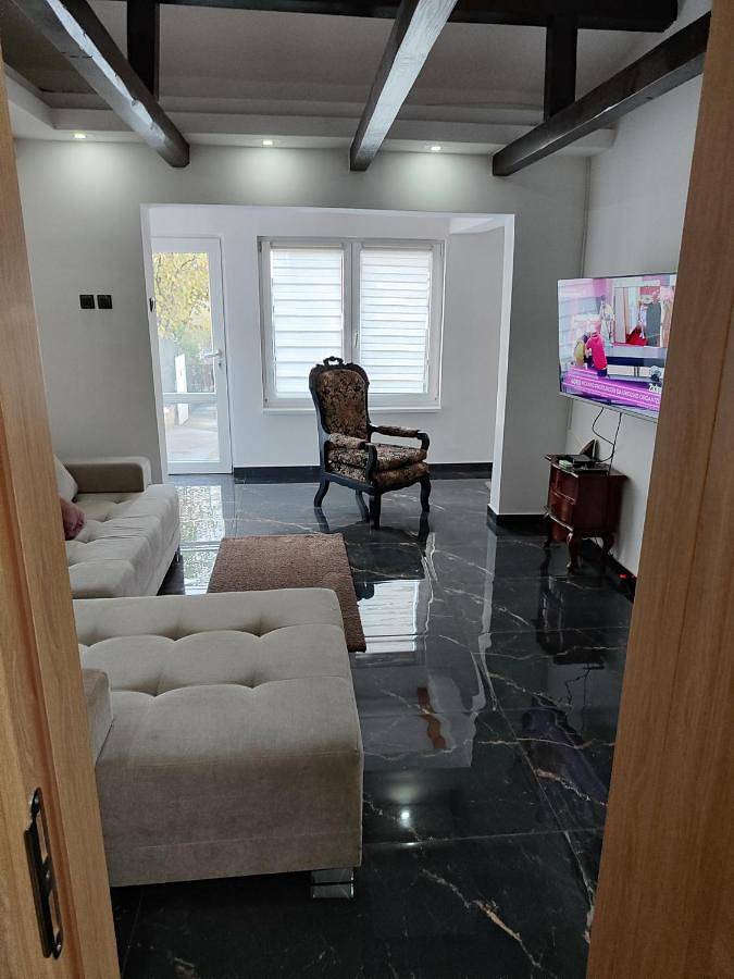 Appartement de vacances pour 4 personnes, avec jardin et terrasse ainsi que piscine et vue