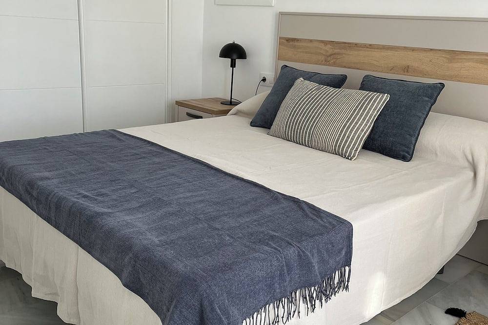 Apartamento entero, Apartamento Marea en primera línea de playa en La Barrosa con vistas al mar in La Barrosa, Chiclana de la Frontera