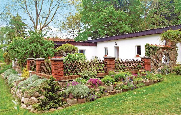 Ferienhaus für 4 Personen, mit Terrasse und Garten sowie Ausblick in Lühmannsdorf
