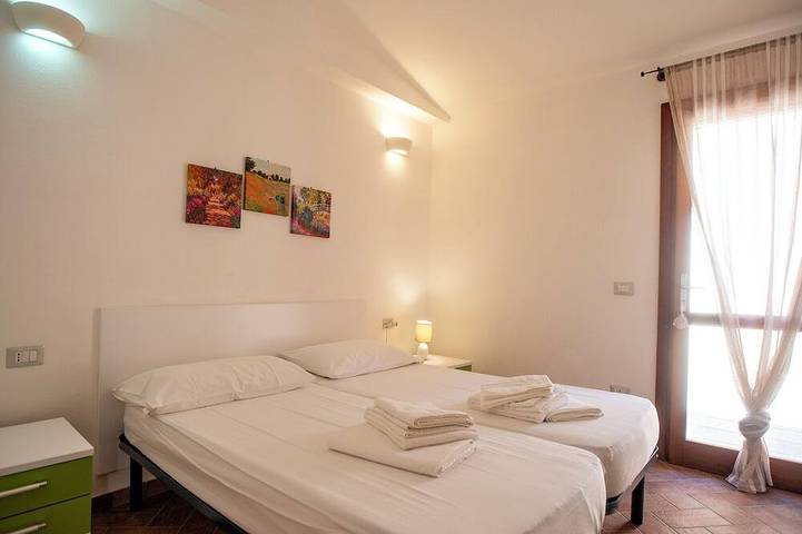 Sea-view three-family villa with shared private pool in Costa Paradiso, Trinità d'Agultu e Vignola