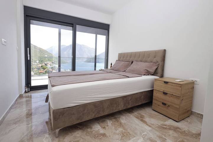 The house is our passion project, built with love surrounded by forest and views in Kamenari, Bay of Kotor
