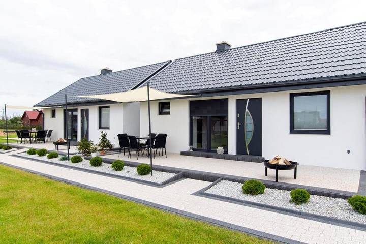 Ferienhaus für 6 Personen, mit Balkon und Terrasse sowie Whirlpool und Garten