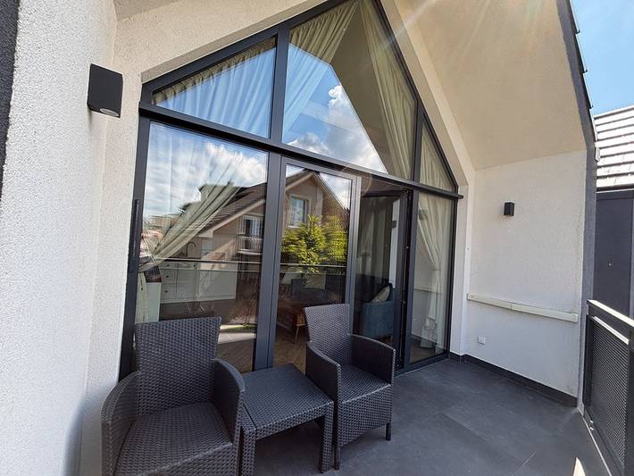 Ferienwohnung für 4 Personen, mit Sauna und Whirlpool sowie Garten in Leba