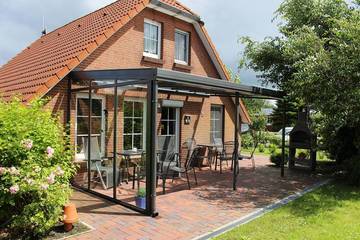 Ferienhaus für 6 Personen, mit Terrasse und Garten in Krummhörn