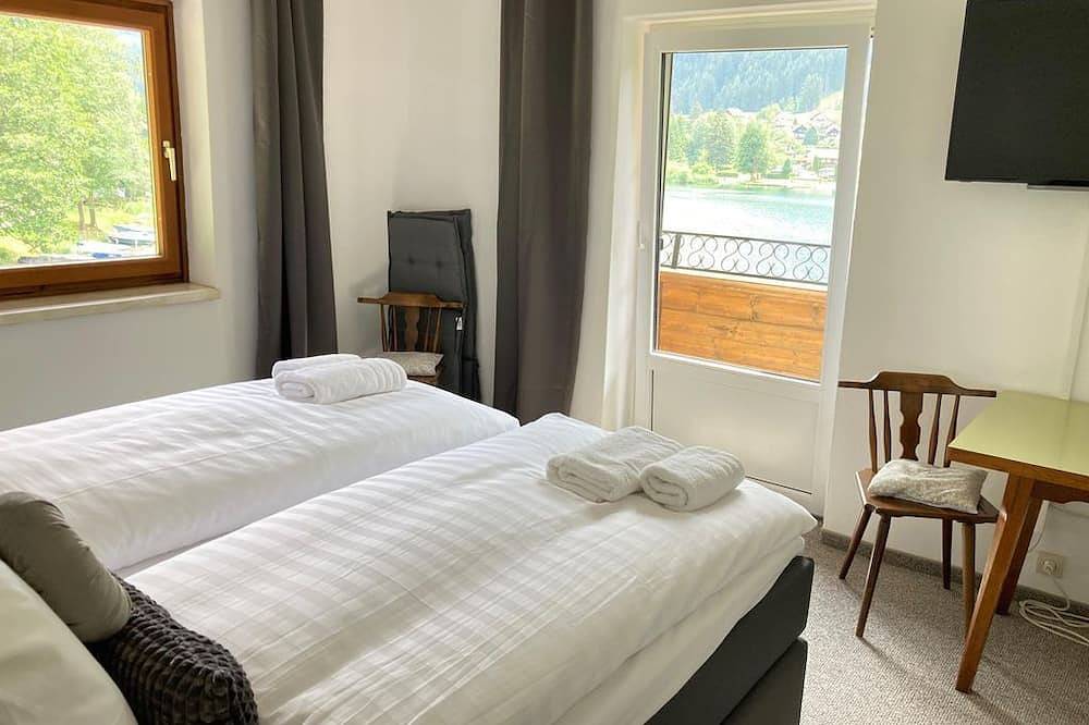 Doppelzimmer Seeblick, 2. Stock - Aparthotel Seebrauer am Afritzer See in Feld am See, Villach-Land