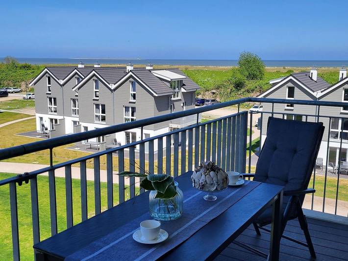 Ferienwohnung mit Meerblick für 2 Personen, mit Balkon und Ausblick in Schillig