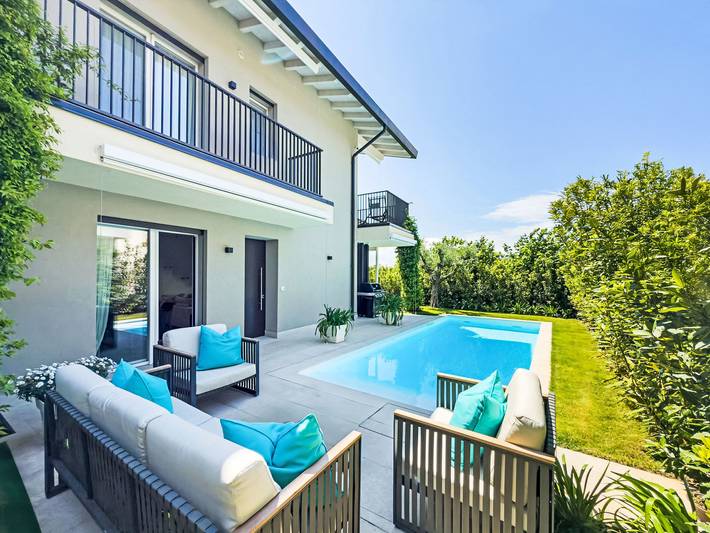 Ferienhaus für 6 Personen, mit Garten und Ausblick in Costermano