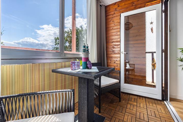 Ferienwohnung für 3 Personen, mit Balkon und Garten sowie Sauna
