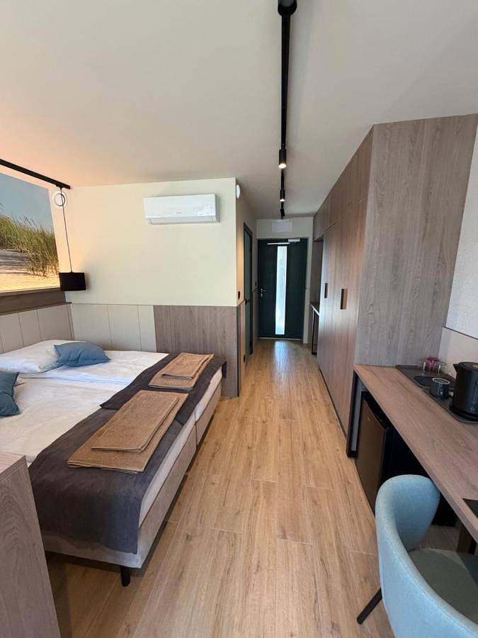 Ferienhaus für 2 Personen, mit Balkon und Garten sowie Pool und Sauna