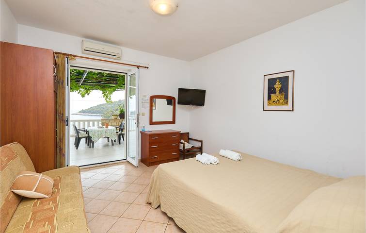 Apartamento de férias inteiro, Retiro à beira-mar: WiFi, AC, Terraço, Estacionamento, 200m da praia in Velika Saplunara, Saplunara