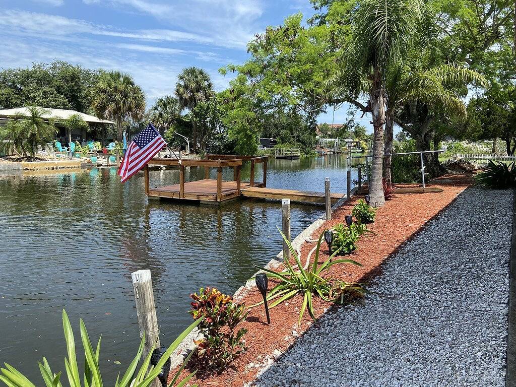 Fully remodeled, adorable coastal canal house on a spacious corner lot. in Hudson, Pasco County