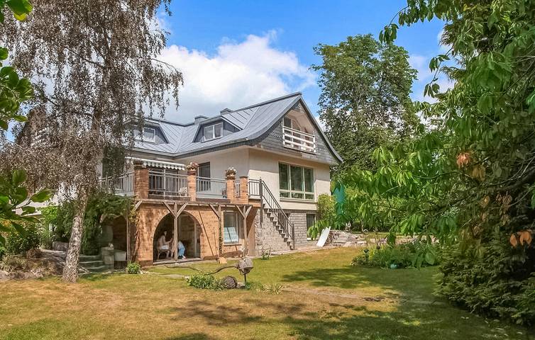 Ferienwohnung für 6 Personen, mit Terrasse und Garten sowie Sauna und Seeblick in Klink