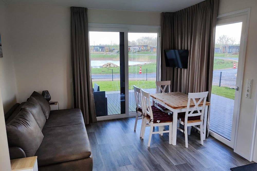 Kinderfreundliches Ferienhaus Chaletpark Süsel - direkt bei der Wakeboardanlage in Süsel, Ostholstein