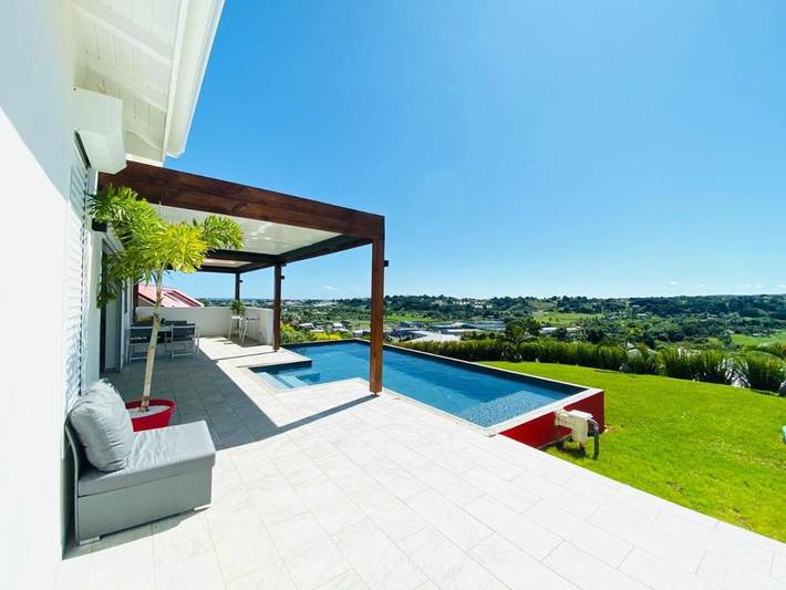 Maison de vacances pour 6 personnes, avec vue ainsi que piscine et jardin à Petit-Bourg