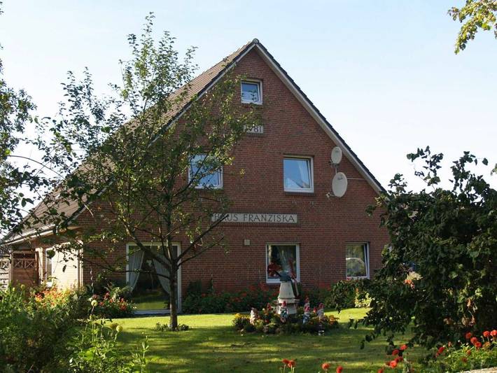 Ferienwohnung für 3 Personen, mit Terrasse und Garten sowie Ausblick in Leck