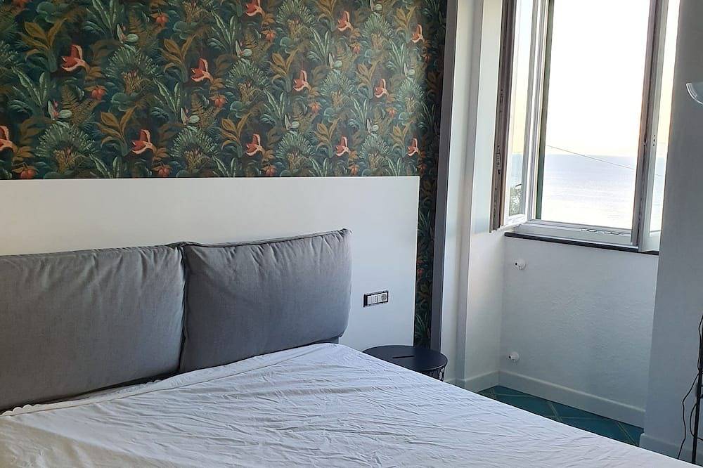 Blu Home gorgeous chalet nestled in a lemon grove overlooking Capri in Massa Lubrense, Naples Province