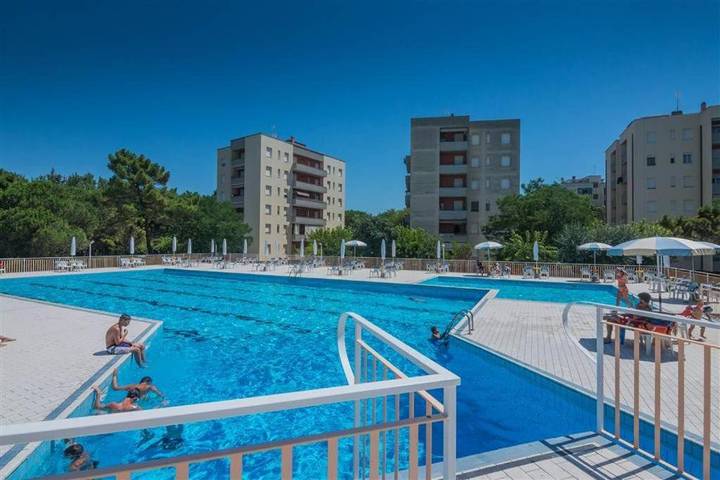 Appartamento per 3 persone, con panorama e giardino nonché piscina in Lido Adriano