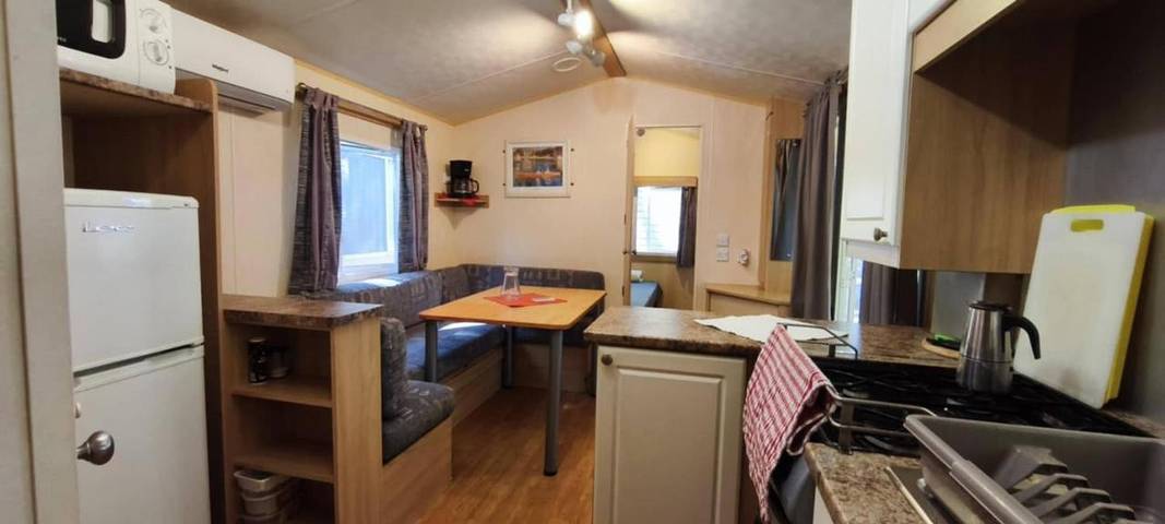 Bungalow per 5 persone, con Terrazza e Giardino nonché Piscina per bambini e Piscina a Lido di Spina