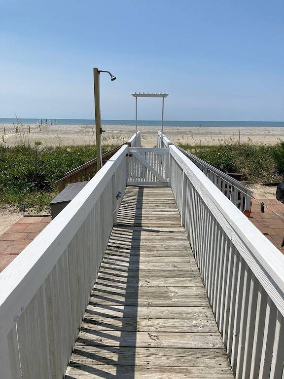 Charming Beachfront Cottage Awaits You! Direct access to beach off deck/walkway. in Oak Island (NC), Brunswick County