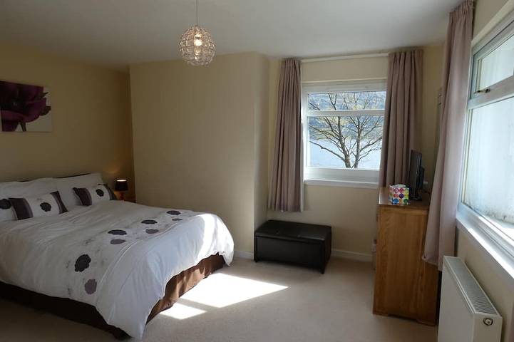 Lochside with beach access uninterrupted views of spectacular Highland Mountains in Highlands