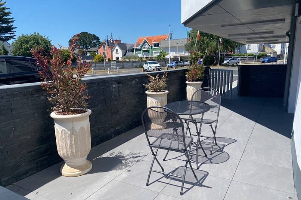 Appartement entier, Larmor-Plage : T2 en résidence de standing avec terrasse et parking, à deux pas de la plage et des commerces in Larmor-Plage, Côte des Mégalithes