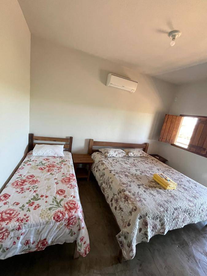 Casas e apartamentos de temporada para 3 pessoas, com sauna e terraço e ainda piscina and vista, com animais de estimação em Delfinópolis