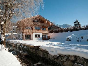 Ferienwohnung für 4 Personen, mit Sauna und Garten sowie Ausblick, kinderfreundlich in Rottach-Egern