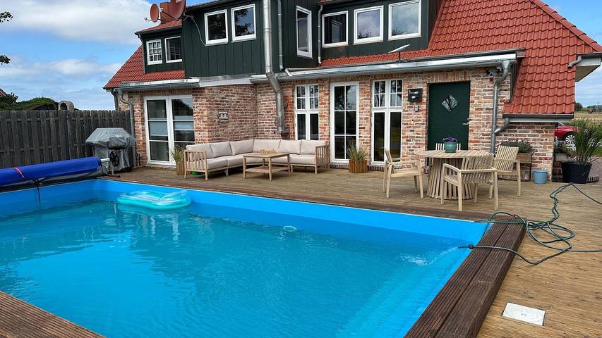 Ferienhaus für 4 Personen, mit Terrasse und Ausblick sowie Garten in Ostermarsch