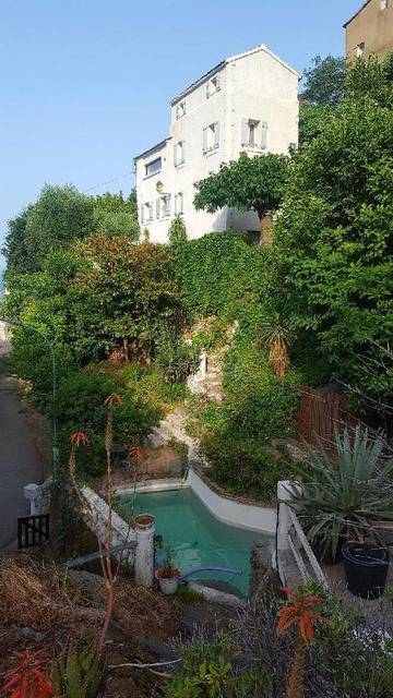 Cottage pour 6 personnes, avec vue et piscine ainsi que sauna et jardin à Biguglia