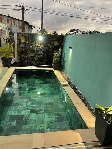 Maison de vacances pour 4 personnes, avec jardin et piscine sur l' Île de la Réunion