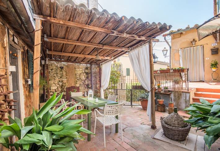 Vakantiehuis 'L'arco Della Fonte' met prive terras, Wi-Fi en airconditioning in Gaiole in Chianti, Chianti