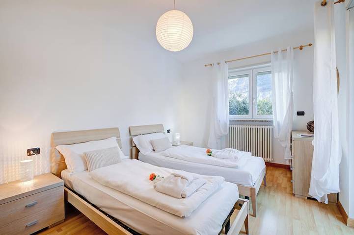 Entire apartment, Agritur Laura - L'angolo dei Fiori 4 with Shared Garden, Torbole sul Garda, Italy in Torbole, Nago-Torbole