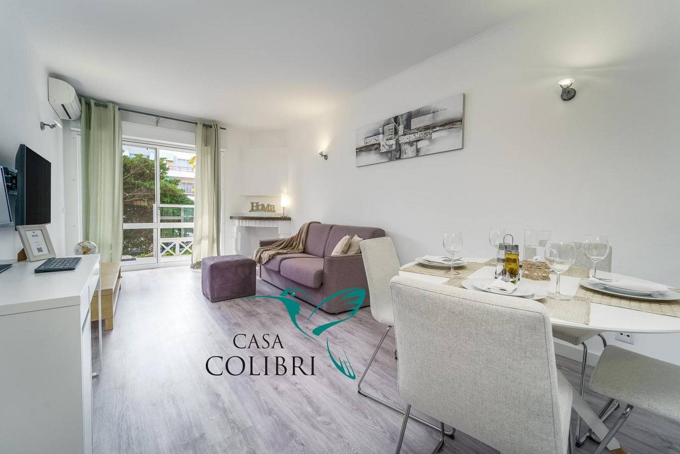 Apartamento entero, Apartamento 'Casa Colibri I Frente al Mar con Wi-Fi y Aire Acondicionado in São Sebastião, Lagos