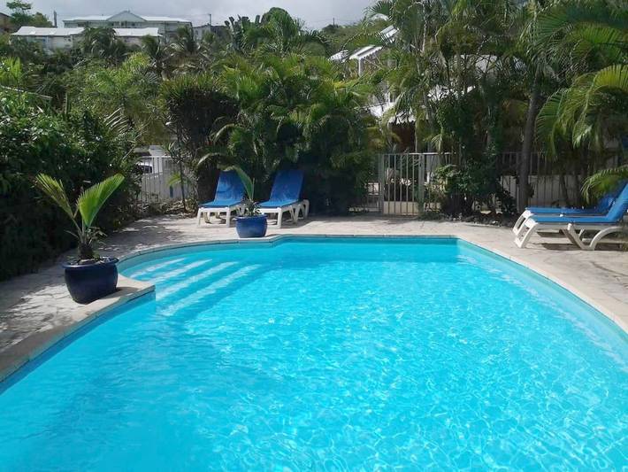 Appartement de vacances pour 4 personnes, avec vue ainsi que piscine et jardin, adapté aux familles