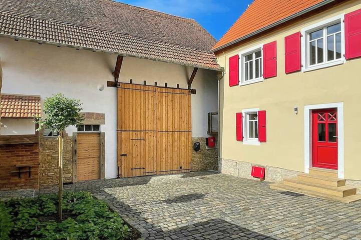 Ferienhaus für 4 Personen, mit Balkon und Garten