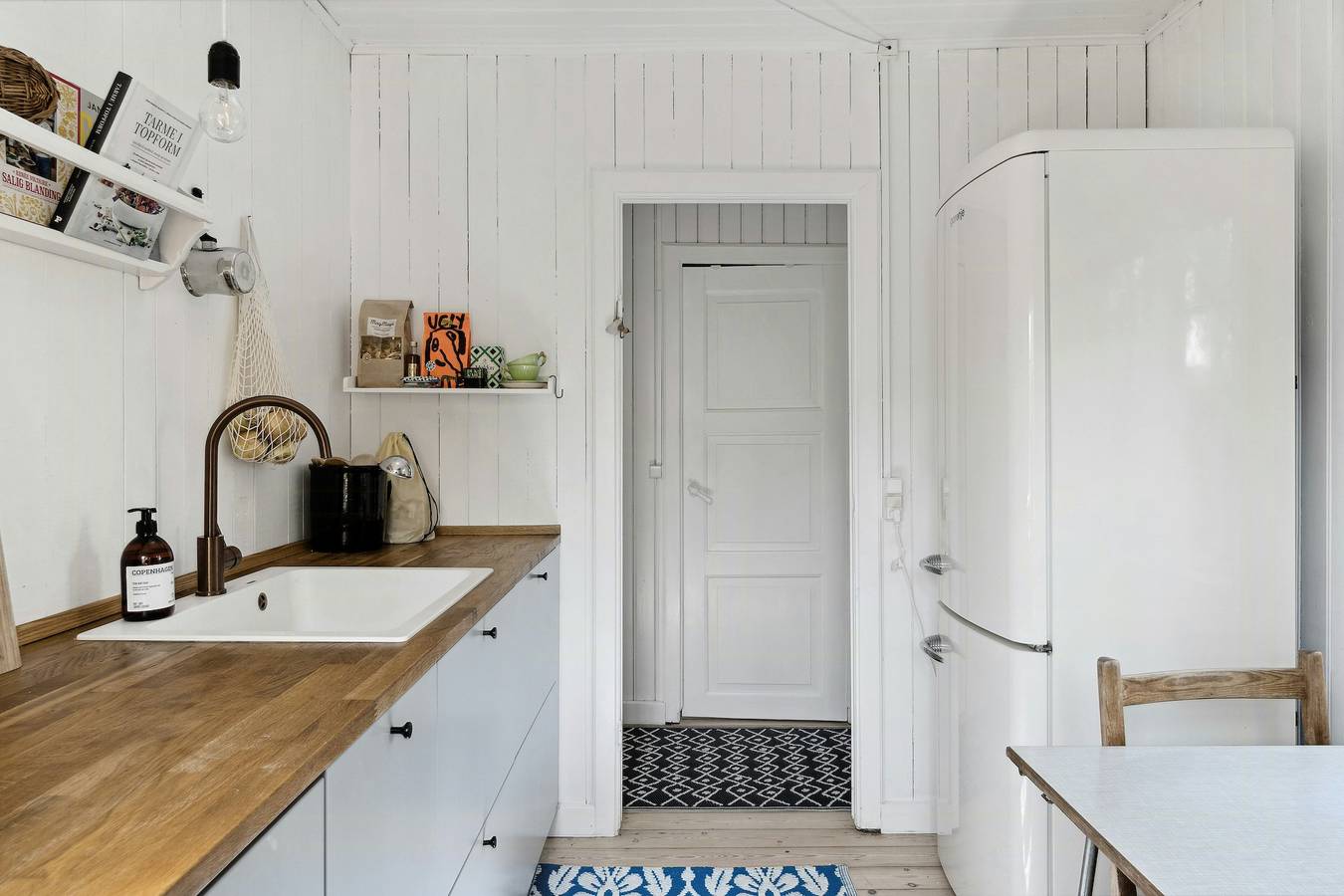 Het kleine, rode houten huis met grote charme in Vejby Strand, Vejby