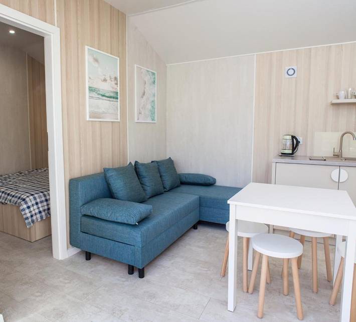 Lodge für 4 Personen, mit Garten