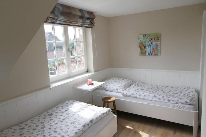 Ganze Wohnung, Drei-Zimmer-Ferienwohnung mit exklusiver Einrichtung und Wohlfühlambiente in Wenningstedt, Sylt