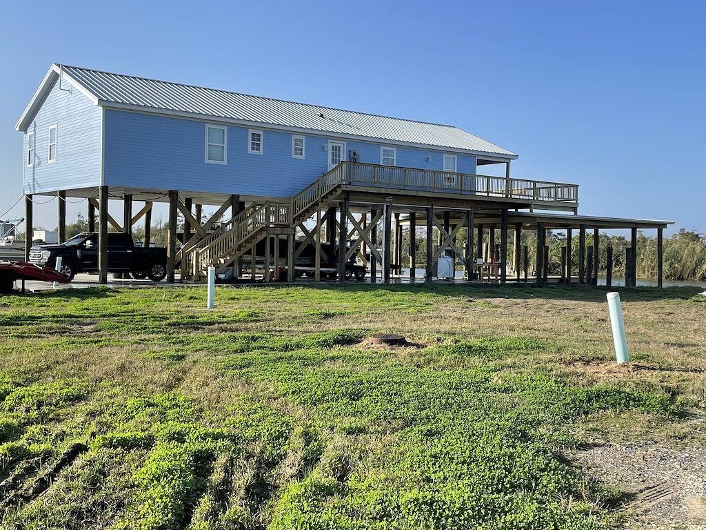 New 3 bedroom 3 full bath house with a boat slip in Plaquemines Parish