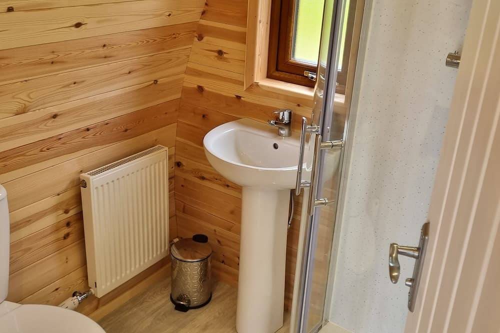 Luzury Glamping Pods on Antrims North Coast with Lake-side views on Fairhead in County Antrim