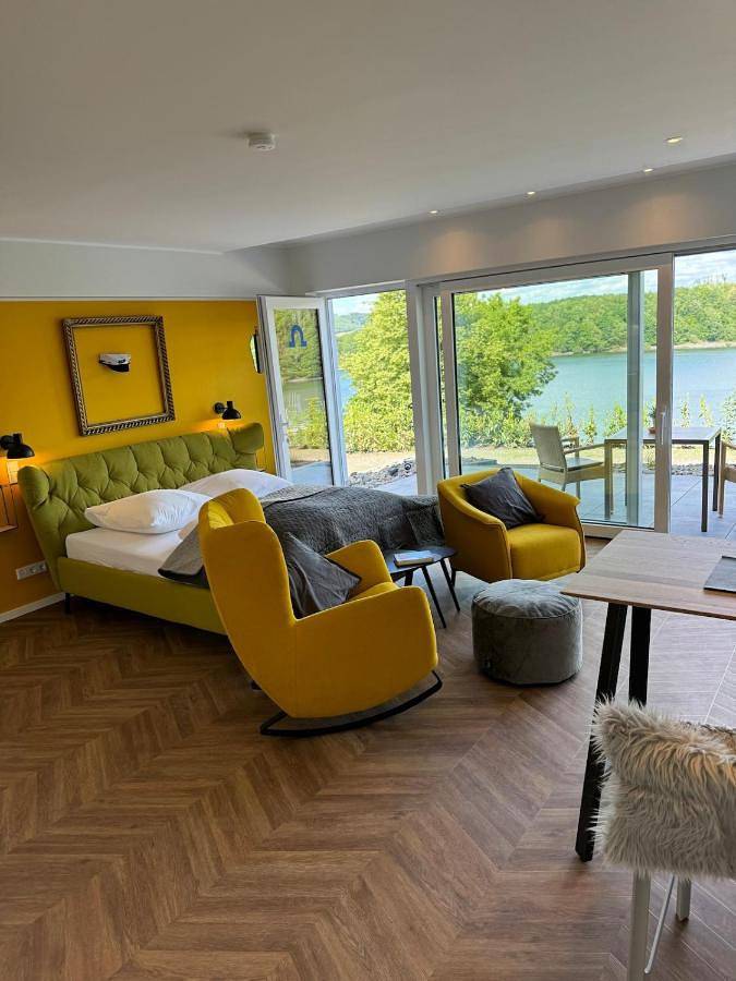 Vakantiewoning voor 2 personen, with Terras and Tuin as well as Sauna and Uitzicht op het meer in Olpe