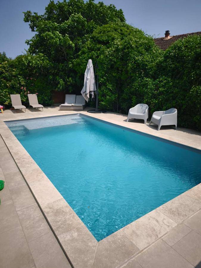 Appartement de vacances pour 4 personnes, avec Terrasse ainsi que Jardin et Piscine
