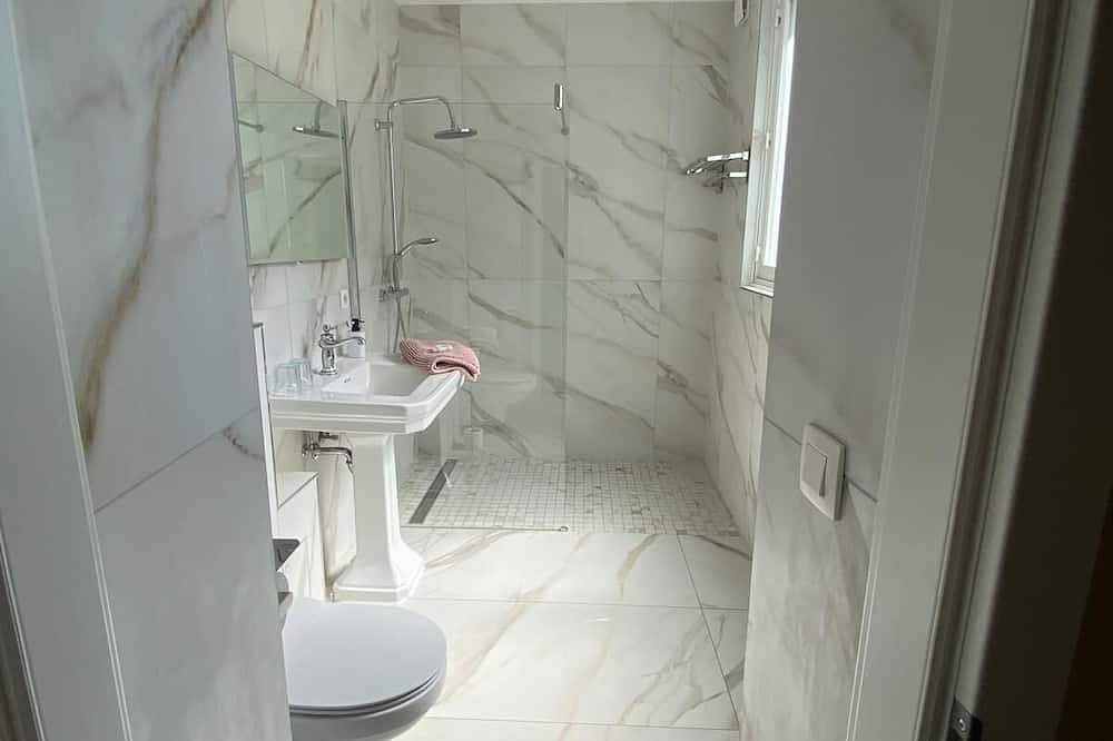 Room with bathroom in the center of the city in a 600-year-old house in Bruges, West Flanders