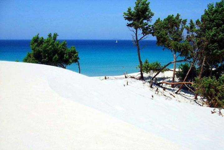 Appartement entier, Appartement de vacances pour 4 personnes avec jardin in Maddalena Spiaggia, Capoterra