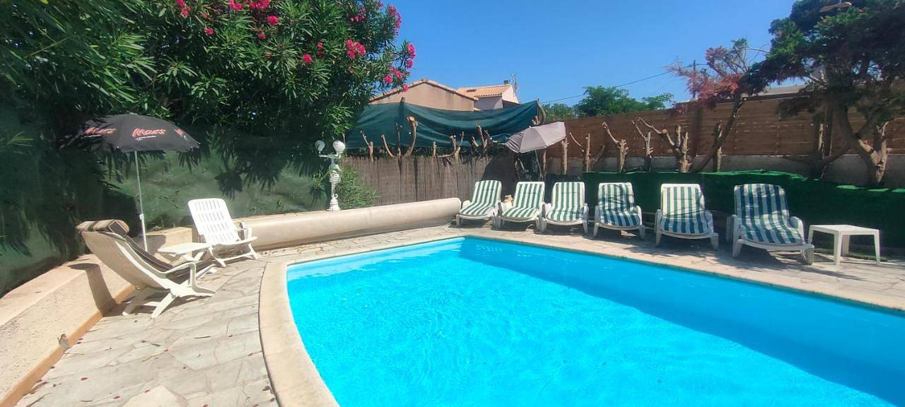 Maison Villa d'exception meublée piscine privée & cheminée a 2min plage et commerces in Marseillan-Plage, Marseillan